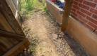 rotting fence posts caused by rain runoff